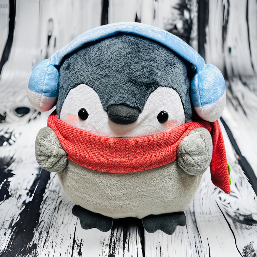 Peluche pinguino con bufanda 
